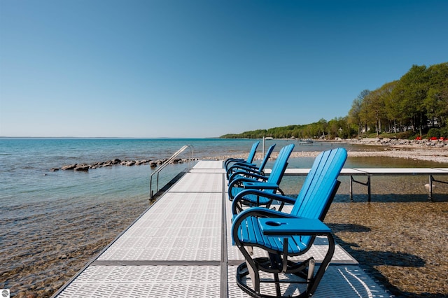 91 S Nanagosa Trl, Suttons Bay, MI 49682 - view of community with a water view and a dock