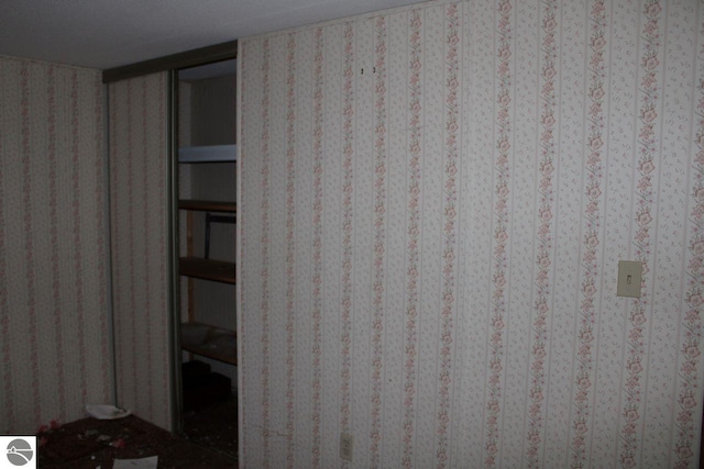 unfurnished bedroom with a textured ceiling