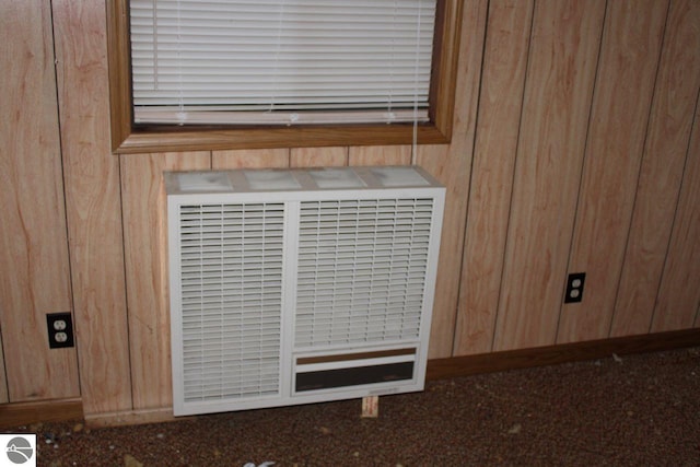 room details featuring wood walls