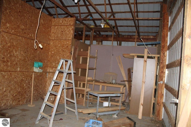 miscellaneous room featuring lofted ceiling