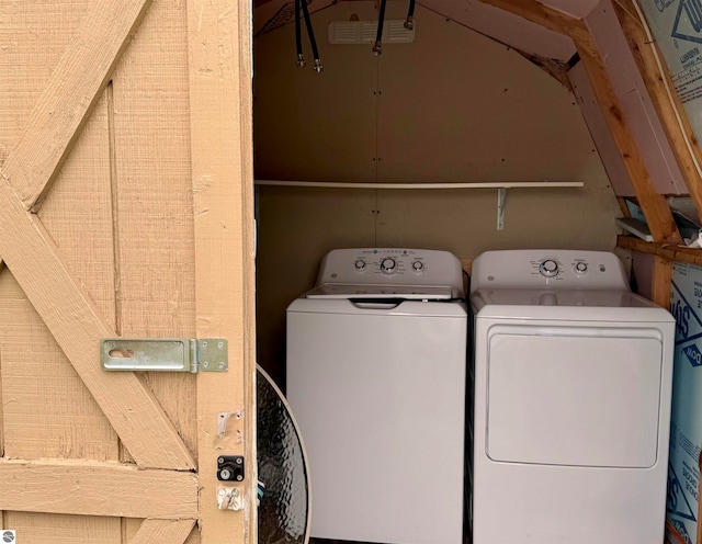 washroom with independent washer and dryer