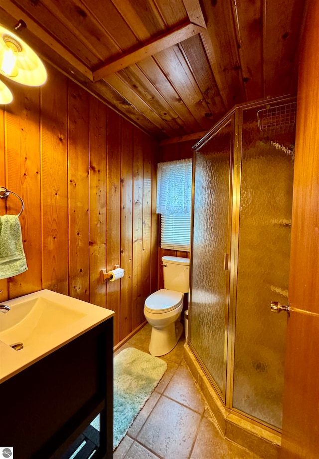 bathroom with wooden walls, wood ceiling, and toilet