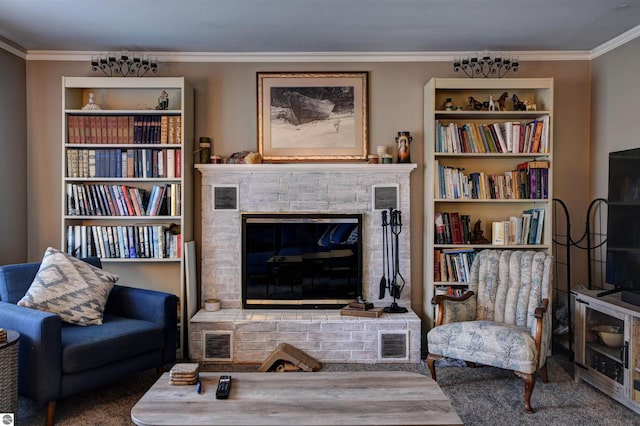 living area with crown molding and a brick fireplace