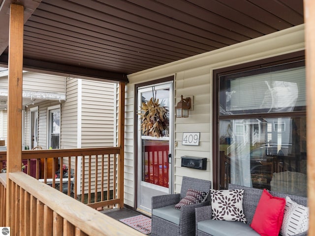 doorway to property with covered porch