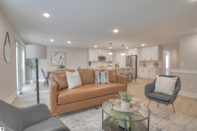 living room featuring light hardwood / wood-style floors