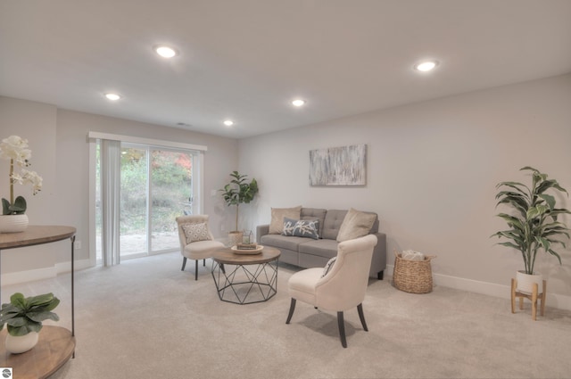 living room featuring light colored carpet