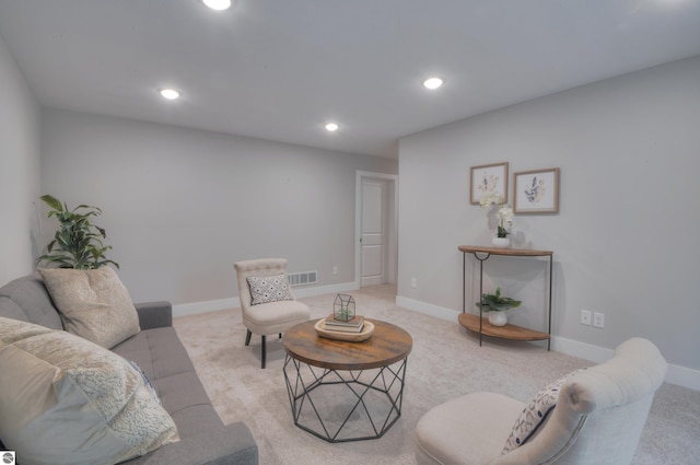 living room featuring light colored carpet