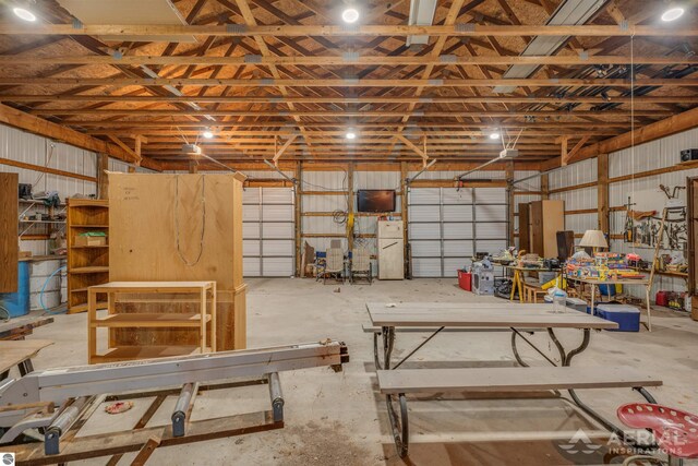 garage featuring white fridge