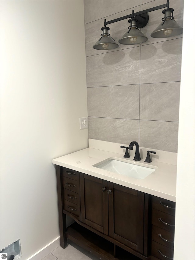 bathroom featuring tile patterned floors and vanity