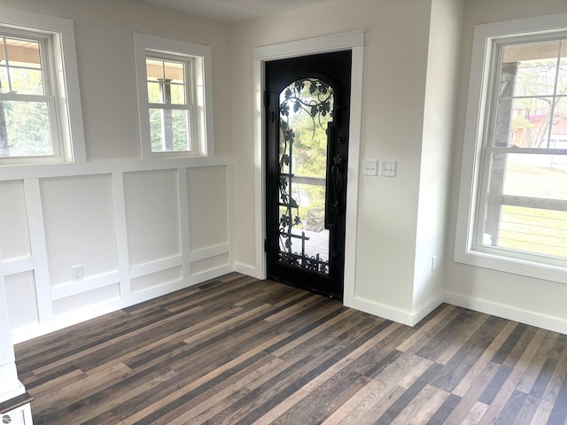 foyer entrance featuring dark hardwood / wood-style flooring