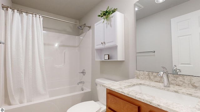 full bathroom featuring vanity, toilet, and shower / tub combo with curtain