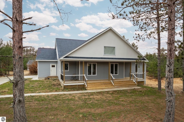 view of front of property with a front lawn and a porch