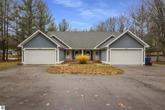 single story home with a garage