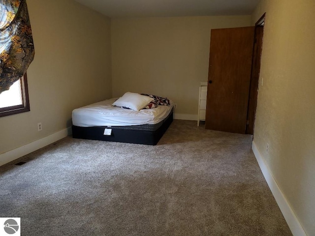 unfurnished bedroom featuring carpet