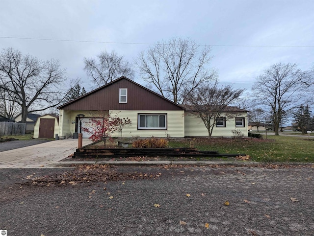 view of front of house with an outbuilding and a garage