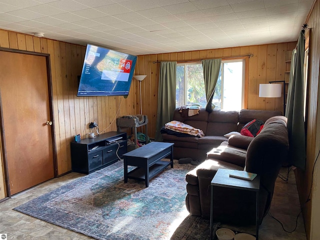 living room featuring wooden walls