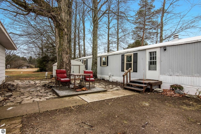 exterior space featuring a storage unit