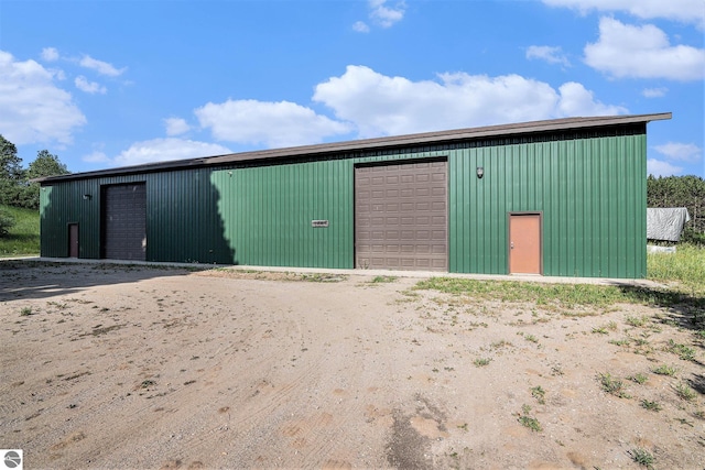 view of outdoor structure with a garage