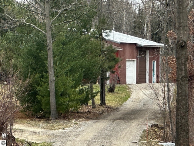 view of outbuilding with a garage