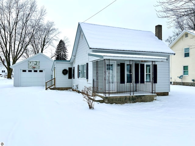 view of front of house with an outbuilding and a garage