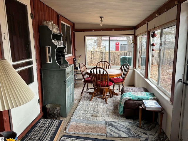 sunroom with lofted ceiling