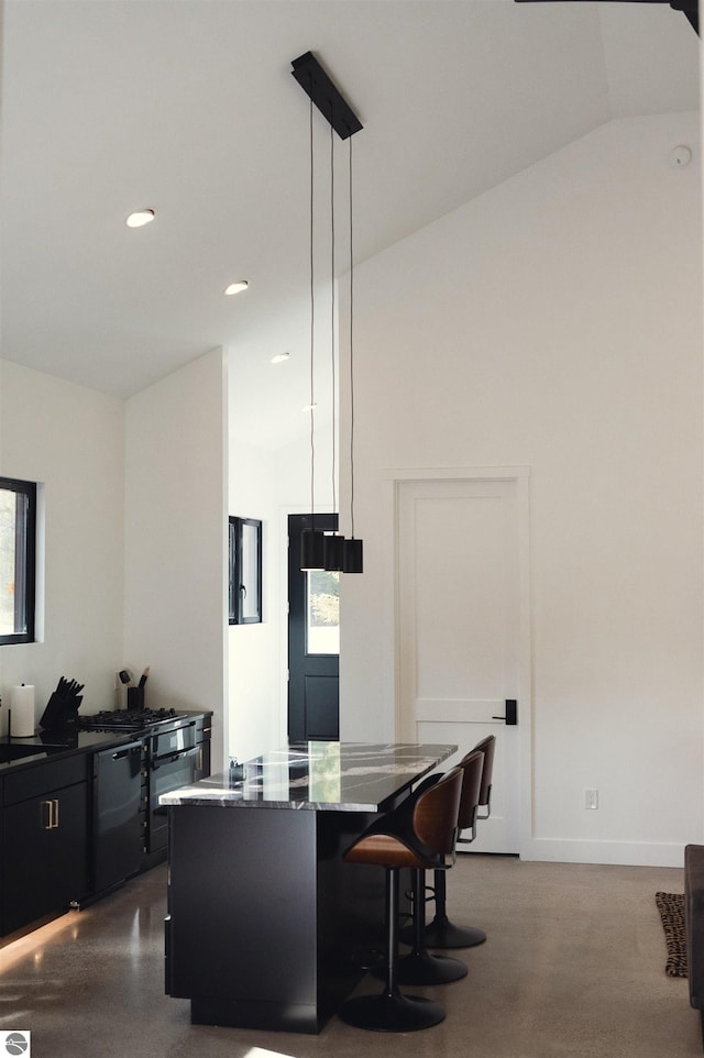 dining room featuring vaulted ceiling