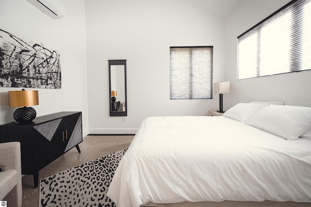 bedroom with carpet flooring, lofted ceiling, and a wall mounted AC