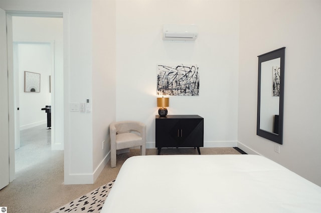 bedroom featuring a wall mounted air conditioner