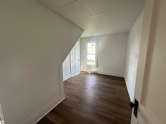 bonus room featuring dark hardwood / wood-style floors