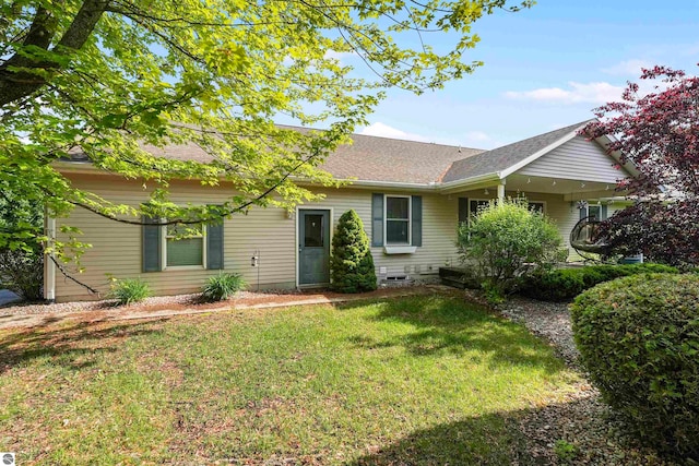 ranch-style home with a front yard