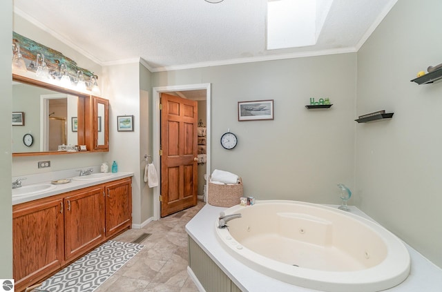 bathroom featuring tile patterned floors, vanity, ornamental molding, and a textured ceiling