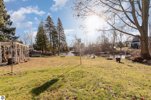 view of yard with a water view