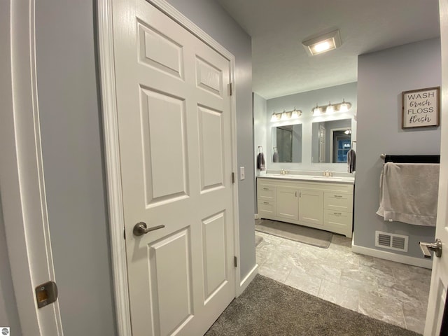 bathroom featuring vanity