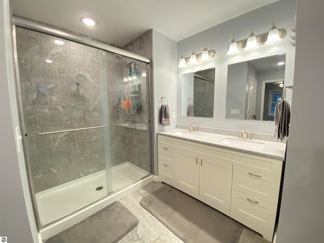 bathroom featuring vanity and walk in shower