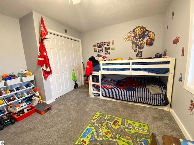 bedroom featuring carpet and a closet