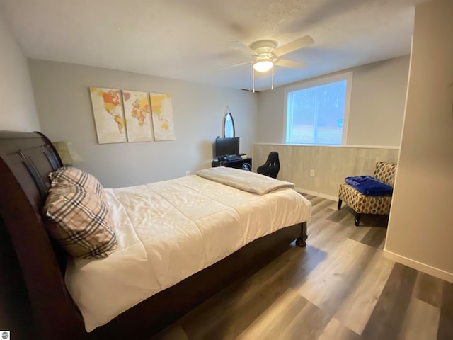 bedroom featuring ceiling fan and light wood-type flooring