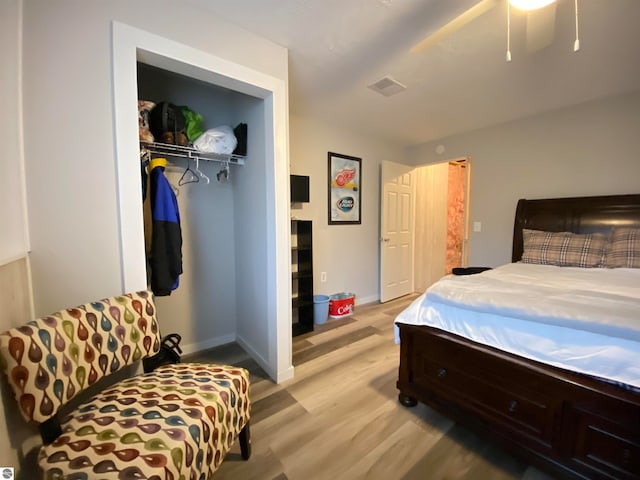 bedroom with a closet and light wood-type flooring