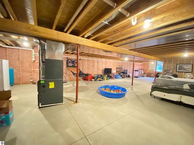 basement with heating unit