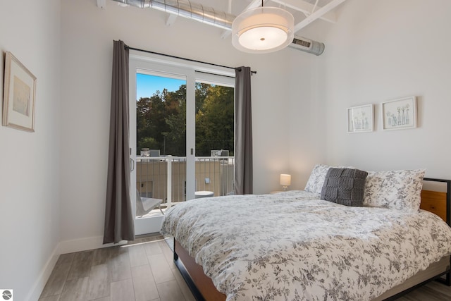 bedroom featuring hardwood / wood-style flooring