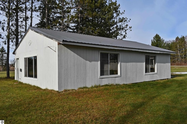 view of property exterior featuring a yard