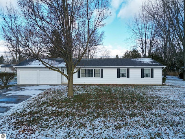 single story home featuring a garage