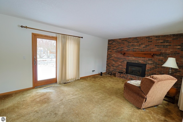 unfurnished living room featuring carpet floors and a fireplace