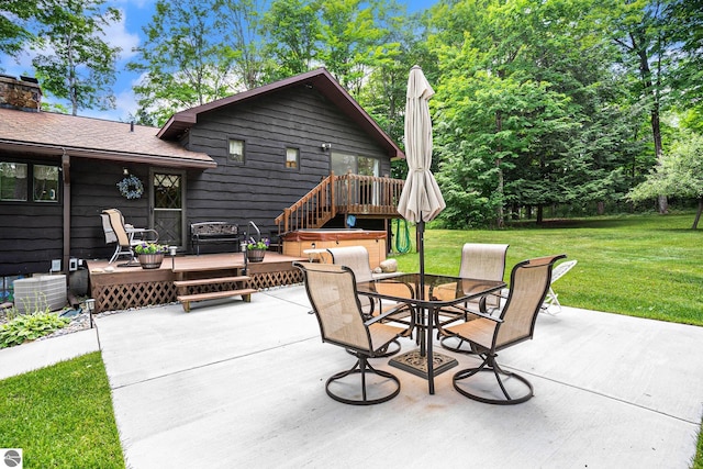 view of patio with a wooden deck, a hot tub, and central AC