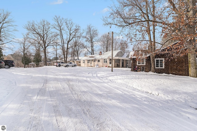 view of yard layered in snow