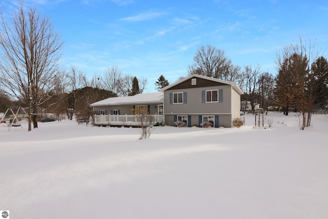 view of snow covered house