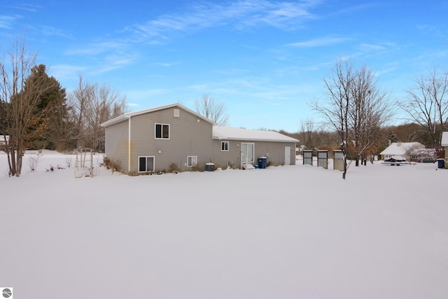 view of snow covered house