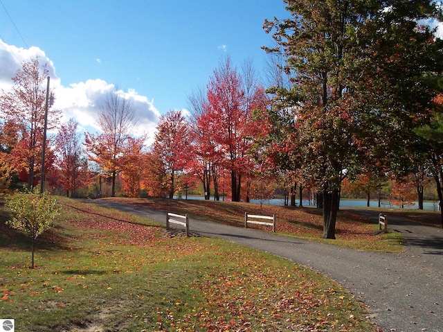 surrounding community with a water view