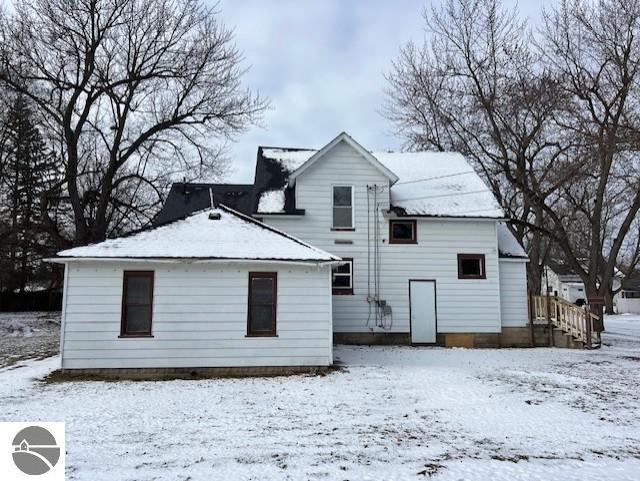 view of snow covered property