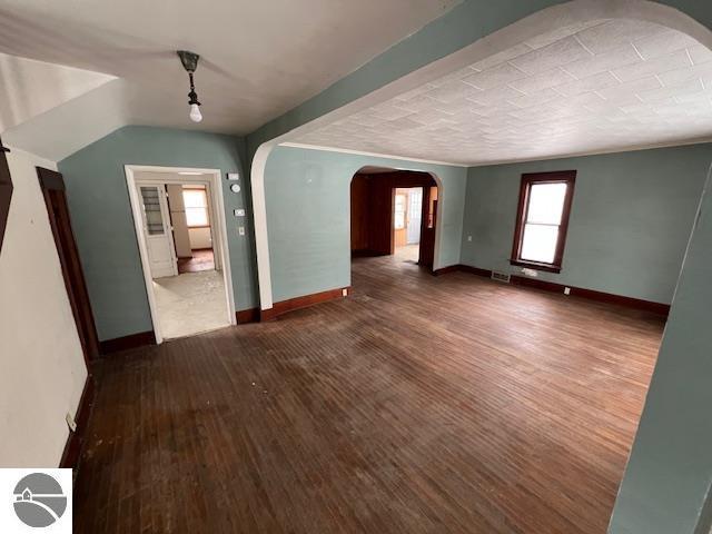 interior space with dark hardwood / wood-style floors