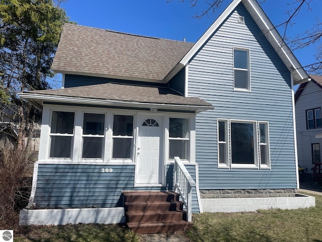 309 E Wisconsin, Mount Pleasant, MI 48858 - view of front facade featuring a shingled roof